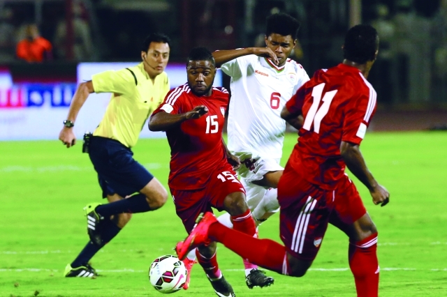 "العواجي خلال ادارته مباراة منتخبنا مع عمان"