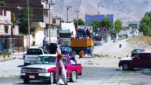 "نزوح جماعي من البلدات في العراق وسوريا خوفاً من الذبح أرشيفية"