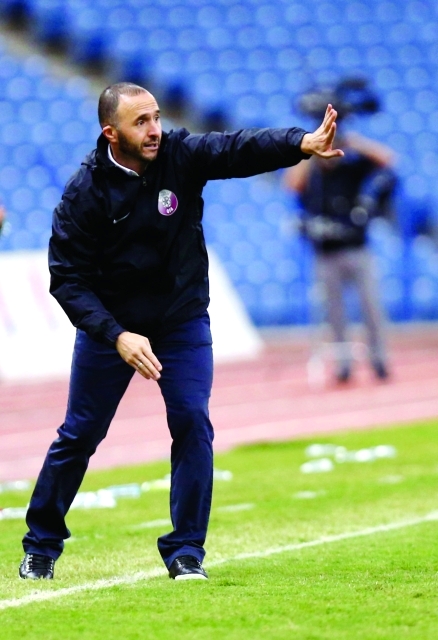 "Qatar's head coach Djamel Belmadi reacts during their Gulf Cup Tournament semi-final soccer match against Oman in Riyadh November 23, 2014. REUTERS/Faisal AlNasser (SAUDI ARABIA - Tags: SPORT SOCCER)"