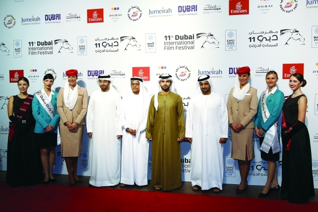 "منصور بن محمد وجمعة بن مكتوم وعبد الحميد جمعة وسعيد النابودة خلال الافتتاح"