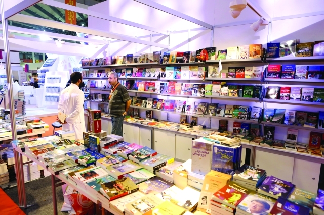 "Book fair at Expo Center Sharjah, November 12, 2014. Photo By Imran Khalid معرض الشارقة الدولي للكتاب في مركز إكسبو الشارقة، نوفمبر 12، 2014. تصوير: عمران خالد"