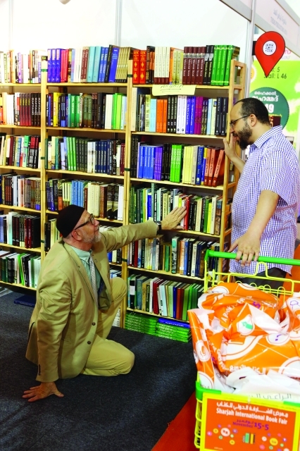 "Book fair at Expo Center Sharjah, November 12, 2014. Photo By Imran Khalid معرض الشارقة الدولي للكتاب في مركز إكسبو الشارقة، نوفمبر 12، 2014. تصوير: عمران خالد"