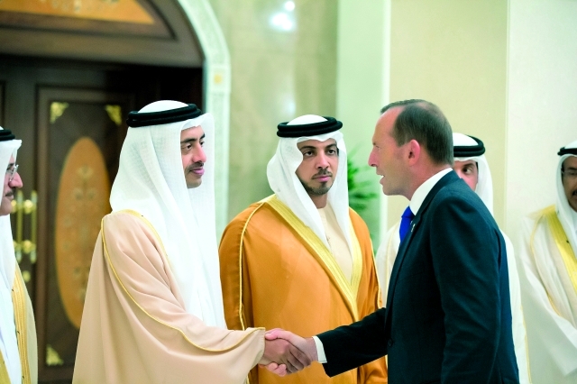 ".. ومصافحاً عبد الله بن زايد"