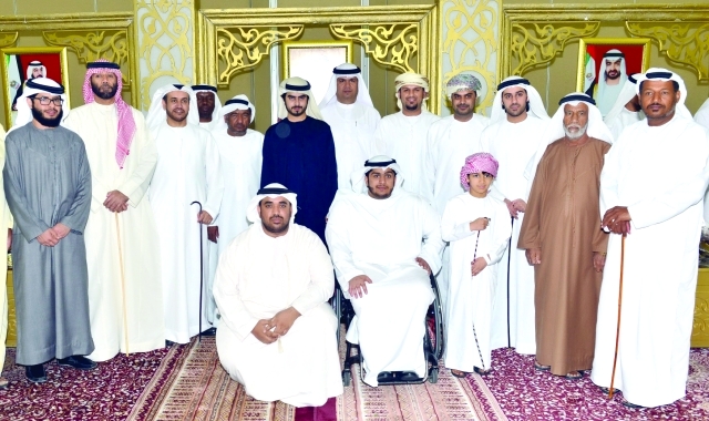 "سلطان بن سعيد بن سرور الظاهري والعريس وعدد من المدعوين"