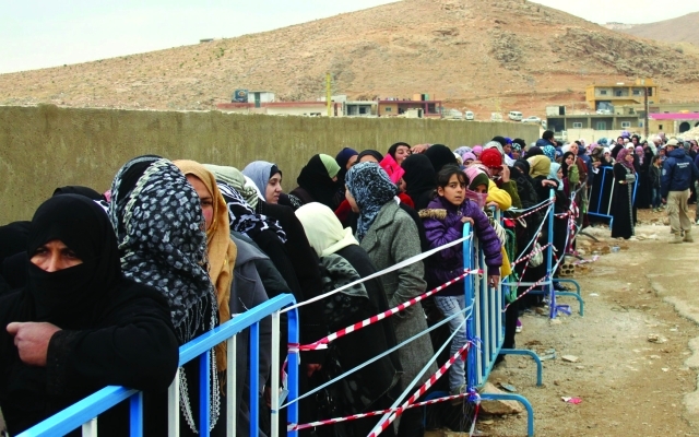 "اللاجئون السوريون يواجهون معاناة في شتى المجالات"