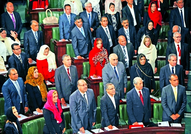 "الماي يؤدي القسم الدستوري مع زملائه مطلع ديسمبر الماضي\tــ أرشيفية"