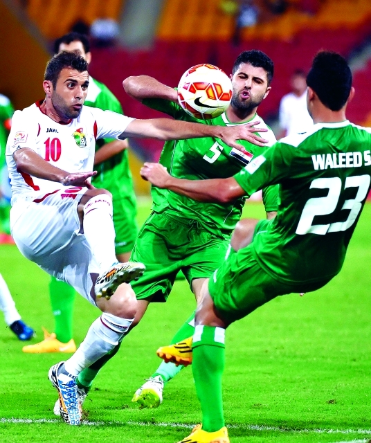"أحمد هايل لاعب الأردن خلال مباراة منتخب بلاده أمام العراق"