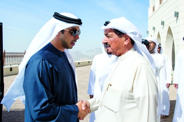 "حميد بن راشد خلال استقبال منصور بن زايد"