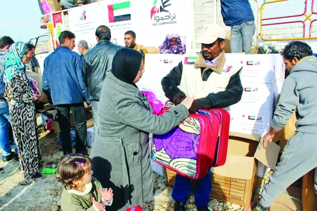 "خلال توزيع المساعدات على اللاجئين في لبنان"