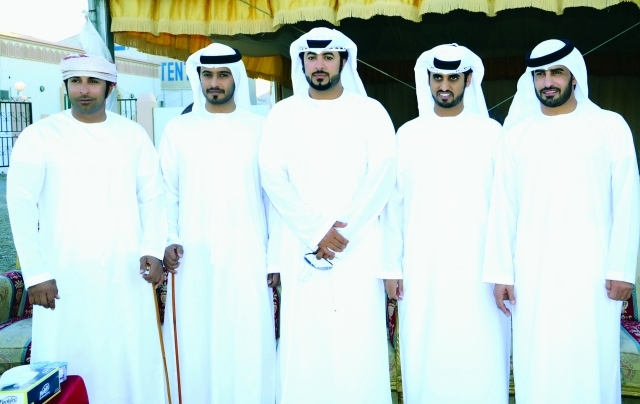 "العريس سهيل وعدد من الأصدقاء"