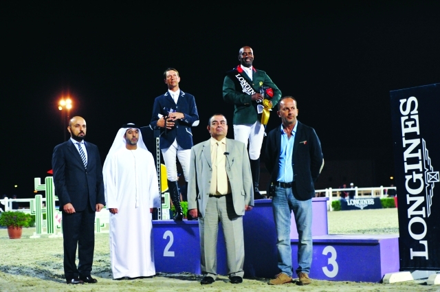 "فيصل العلي والخولي وباتريك عون عقب تتويج البطل المغربي عبد الكبير-البيان"