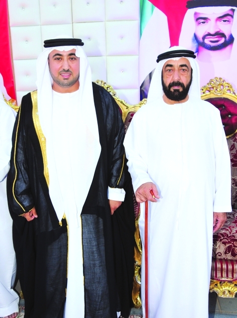 "العريس ووالده"