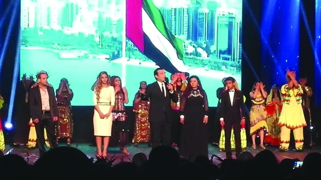 "إيهاب توفيق خلال أوبريت الحفل"