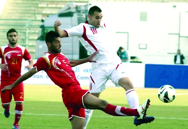 "جانب من لقاء سابق بين المنتخب الأردني والسوري - البيان"