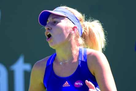 "INDIAN WELLS, CA - MARCH 13: Daria Gavrilova of Russia reacts to a point in her match against Simona Halep of Romania during the BNP Parisbas Open at the Indian Wells Tennis Garden on March 13, 2015 in Indian Wells, California. Harry How/Getty Images/AFP == FOR NEWSPAPERS, INTERNET, TELCOS & TELEVISION USE ONLY =="