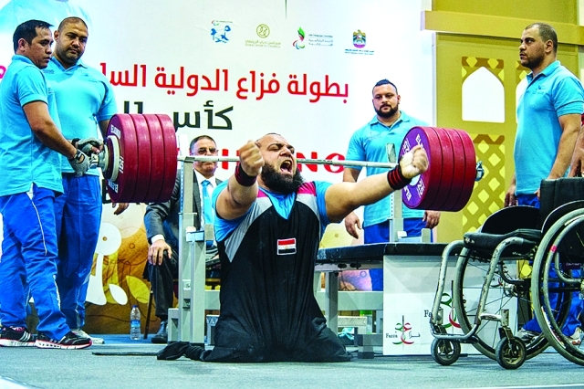 "بطلنا الأولمبي محمد خميس خلال إحدى محاولاته الناجحة"