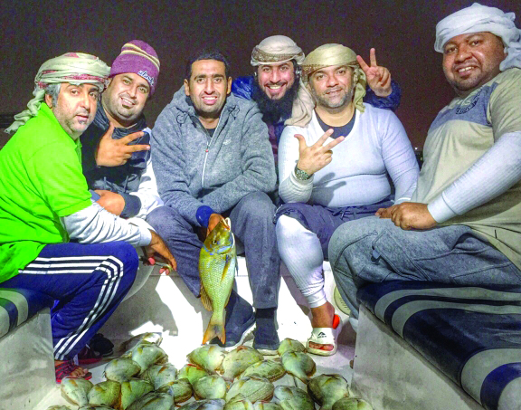 "خالد في رحلة صيد بحرية مع أصدقائه"