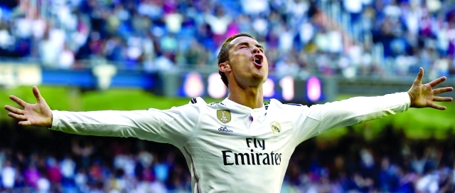 "رونالدو يحتفل بالخماسية التاريخية أ ف ب"