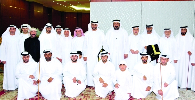 "أحمد آل سويدن والعريسان والأهل والأصدقاء"