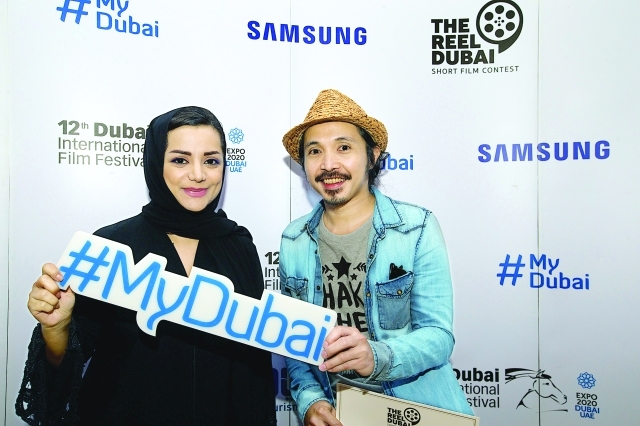 "نايلة الخاجة مع كميل روكسيس الفائز بالمركز الأول"