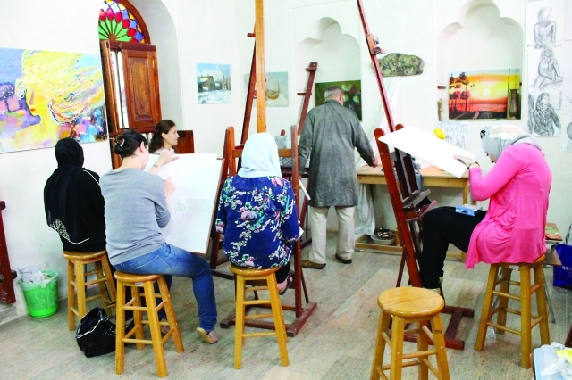 "ورشة الرسم بالفحم"