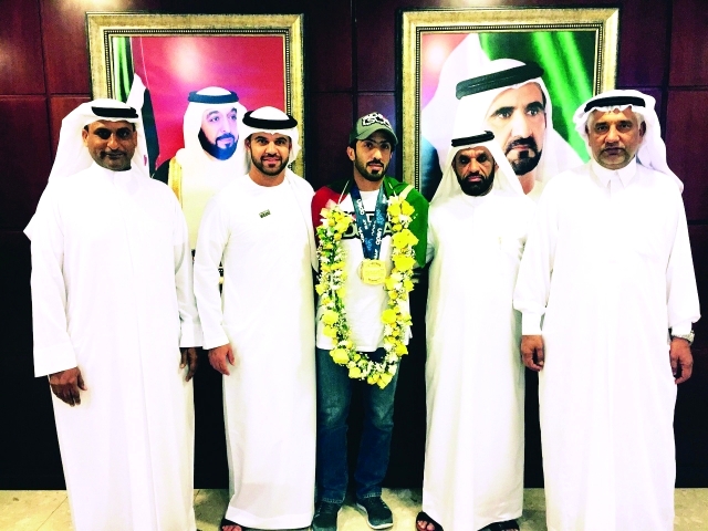 "■ خلال استقبال البطل أحمد الكتبي"