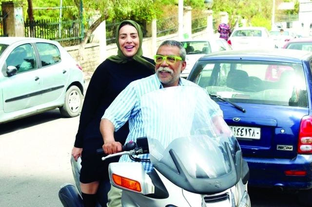 "■ ايمن رضا وشكران مرتجى في أحد مشاهد المسلسل"