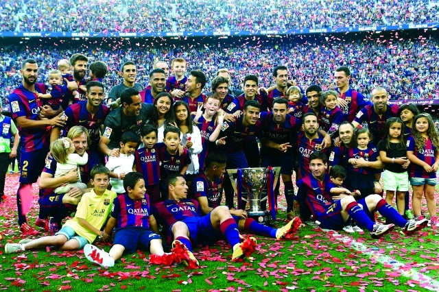 "■ برشلونة يحتفل بالتتويج بطلاً لليغا | أ ف ب"