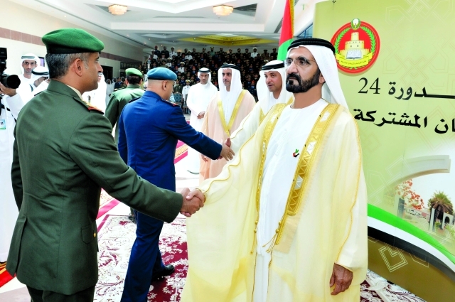 "■ نائب رئيس الدولة يصافح الضباط بحضور هزاع وسيف بن زايد"