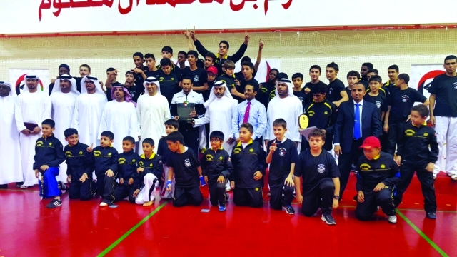 "■ لقطة جماعية للفائزين في مسابقة كأس التايكواندو | البيان"