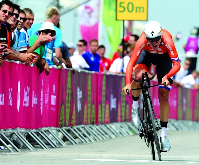 "epa04805905 Ellen van Dijk of the Netherlands cross the finish line in the Women's Individual Time Trial in the Cycling Road competition at the Baku 2015 European Games in Baku, Azerbaijan 18 June 2015. Van Dijk won gold. EPA/VASSIL DONEV"