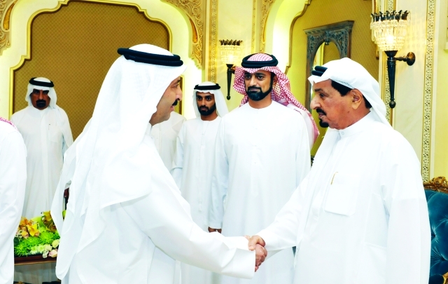 "■ حميد بن راشد النعيمي يستقبل المهنئين بحضور عمار بن حميد | وام"