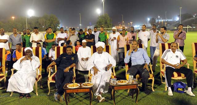 "السفير السوداني أحمد يوسف محمد خلال متابعته المباراة"