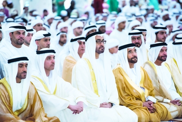 "■ محمد بن زايد خلال استماعه لخطبة العيد بحضور سيف وسرور بن محمد وهزاع ونهيان بن زايد | وام"