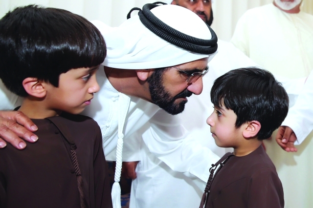 "■ سموه محتضناً ابني الشهيد"