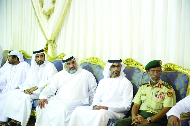 "خالد بن محمد بن زايد وحمد الرميثي وعدد من الحضور خلال العزاء"