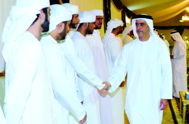 "■ ويصافح ذوي الشهيد خلال العزاء"