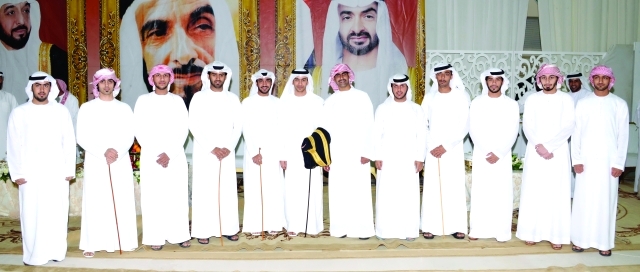 "العريس سعيد وعدد من الأصدقاء"