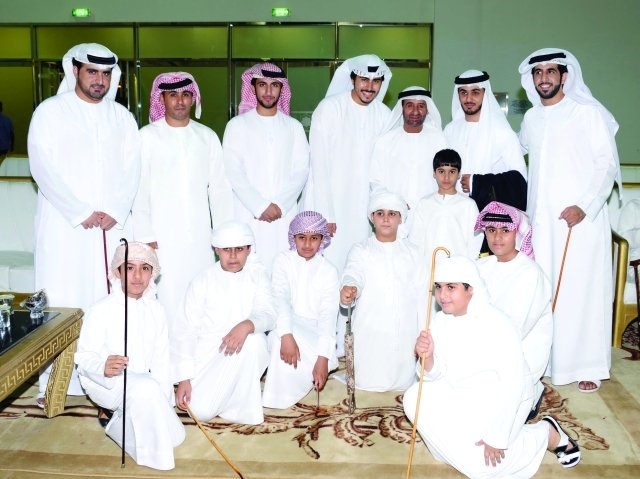 "العريس ووالده وجانب من الأهل"