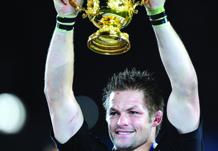 "New Zealand All Blacks captain Richie McCaw holds the Webb Ellis cup after the 2011 Rugby World Cup final match New Zealand vs France at Eden Park Stadium in Auckland on October 23, 2011. AFP PHOTO / FRANCK FIFE"