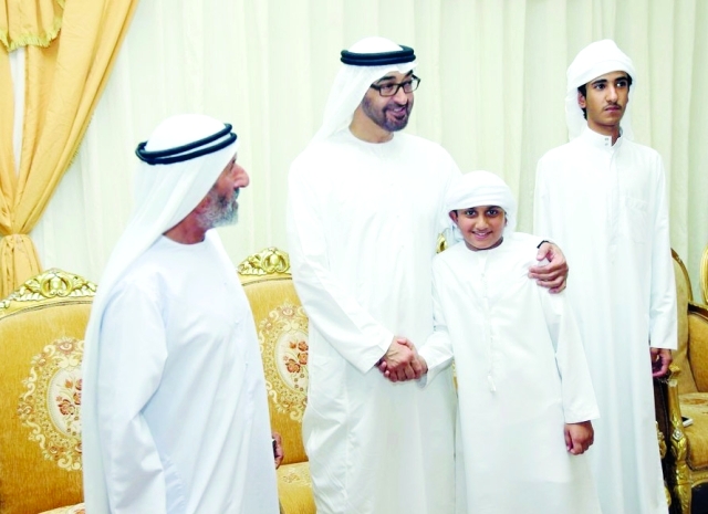 "■ سموه مع ذوي الشهيد محمد الخاطري"