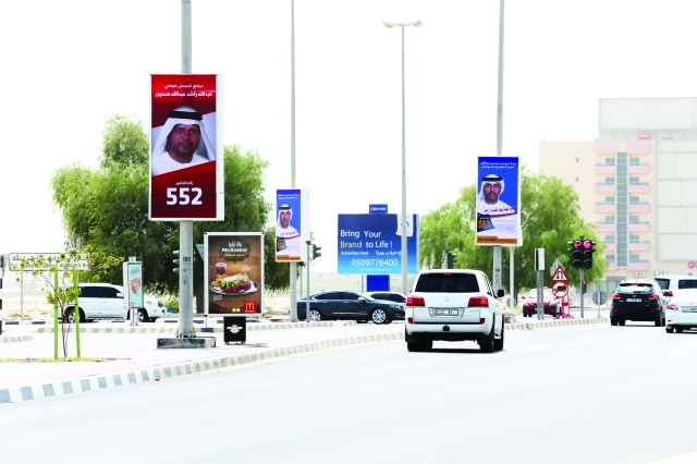 "إعلانات للمرشحين على طول شارع الملك فيصل | تصوير ـ غلام كاركر"