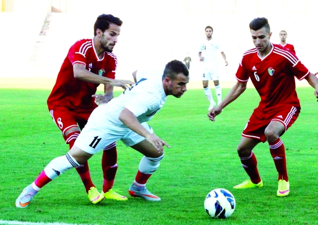 "■ المنتخب الأولمبي الأردني في إحدى مبارياته"