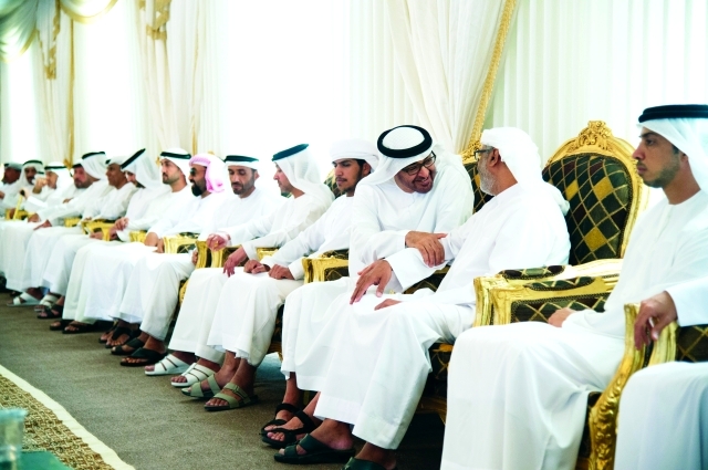 "■ محمد بن زايد معزيا أسرة الشهيد هزاع الكعبي يرافقه هزاع ونهيان وطحنون ومنصور بن زايد وام"