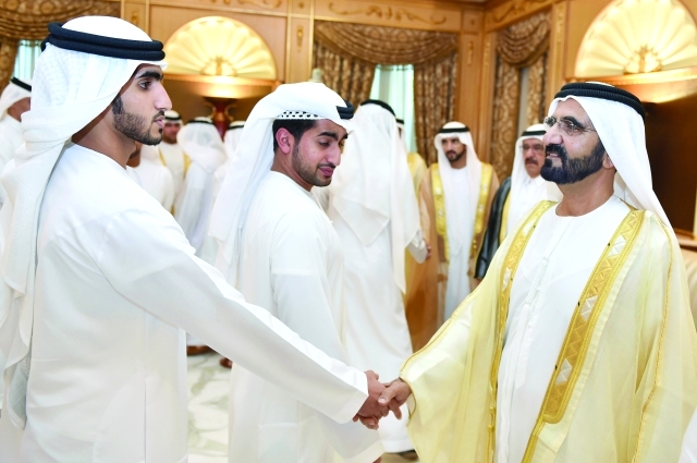 "■ محمد بن راشد وحمدان بن محمد وحمدان بن راشد يتقبلون التهاني من المواطنين"