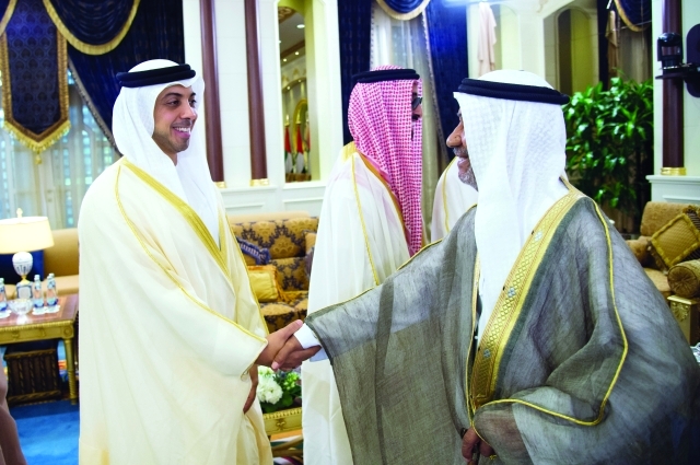 "■ منصور وطحنون بن زايد يتلقيان التهاني بالعيد"