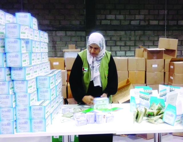 "أثناء تعبئة وجبات الافطار"