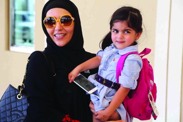 "■ شيرين يوسف أول ناخبة جاءت مع ابنتها"