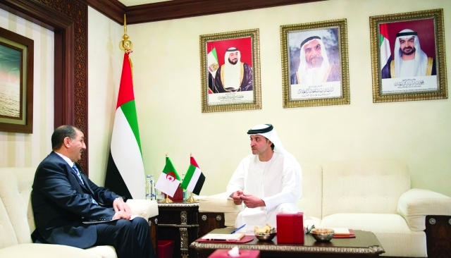 "■ هزاع بن زايد خلال استقبال سفير الجزائر"