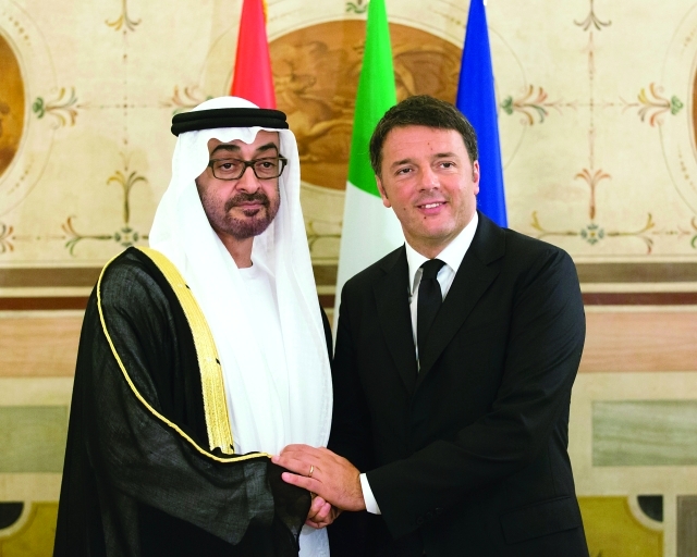"سموه مصافحاً رئيس وزراء إيطاليا خلال اللقاء"